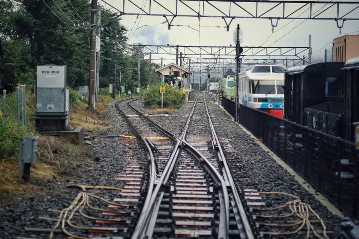 A railroad track diverging at a fork